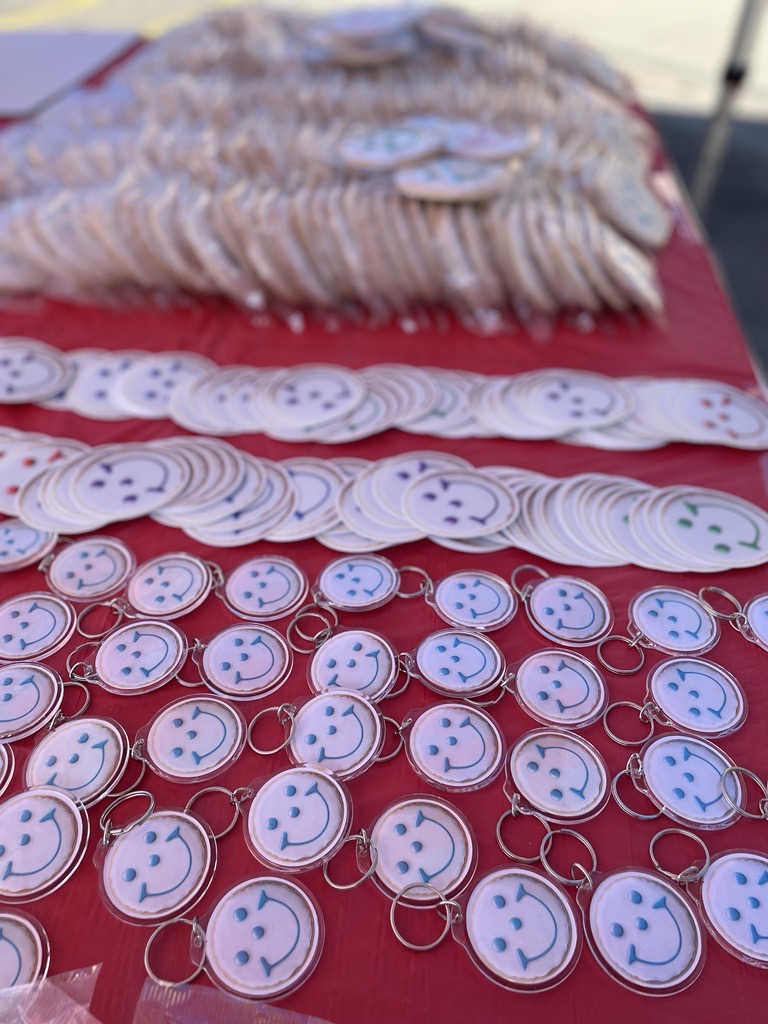 a table filled with Smiley swag