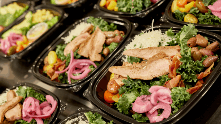 a series of steak salads lined up in rows