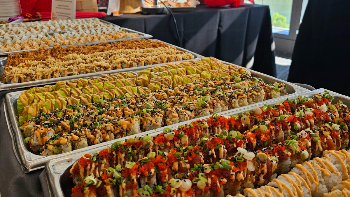 Rows of sushi on a table at a Parkhurst pop-up event