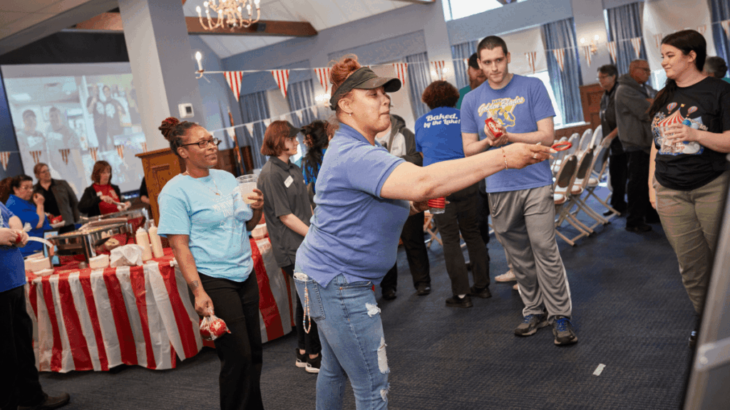 a group of team members playing games at a party