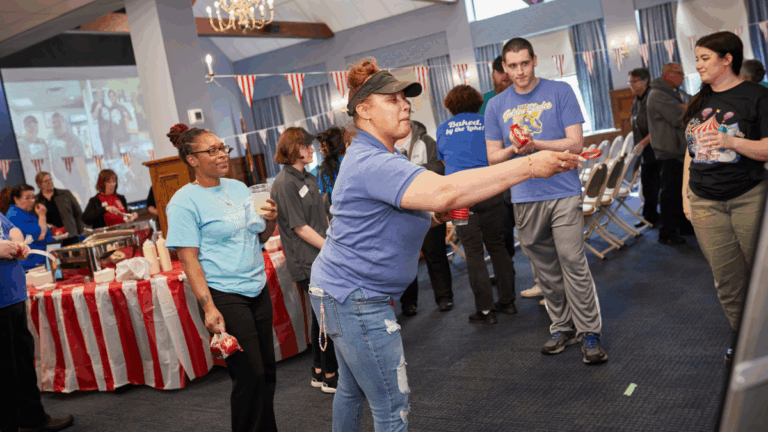 a group of team members playing games at a party