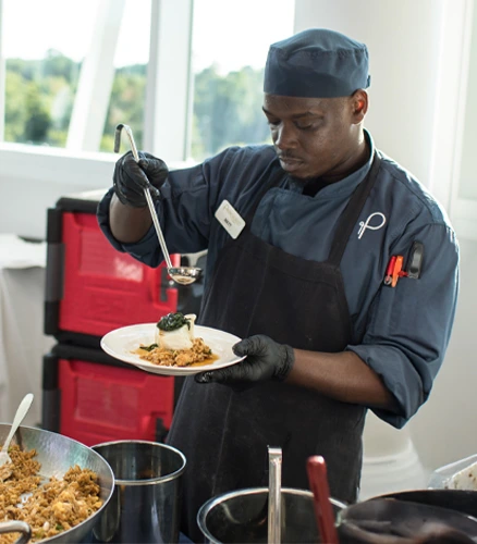 A nutritious meal is being prepared to be served by a Parkhurst Culinary Leadership team member with a passion for food.