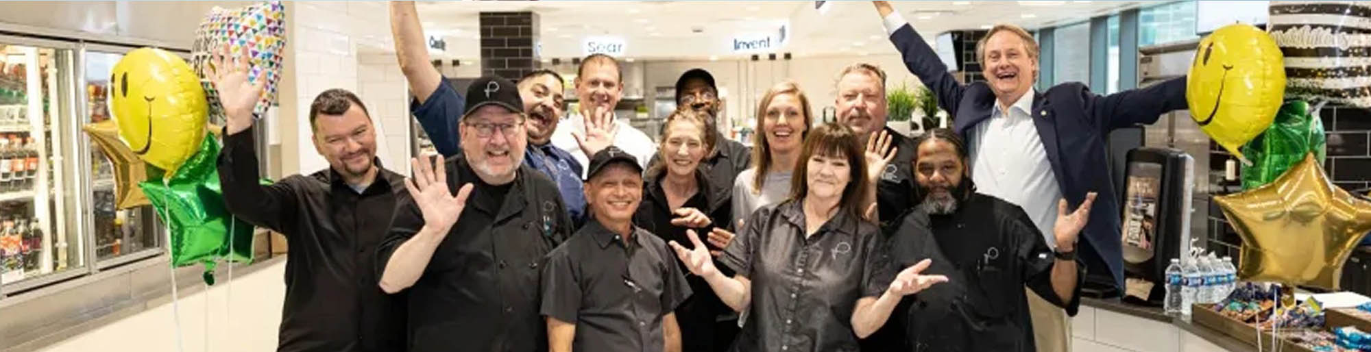 A group of Parkhurst chefs is excited to show their hospitality to guests.