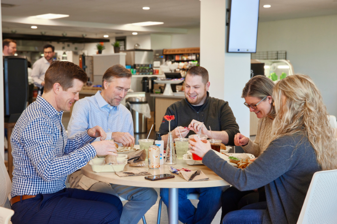 group at a table eating lunch together