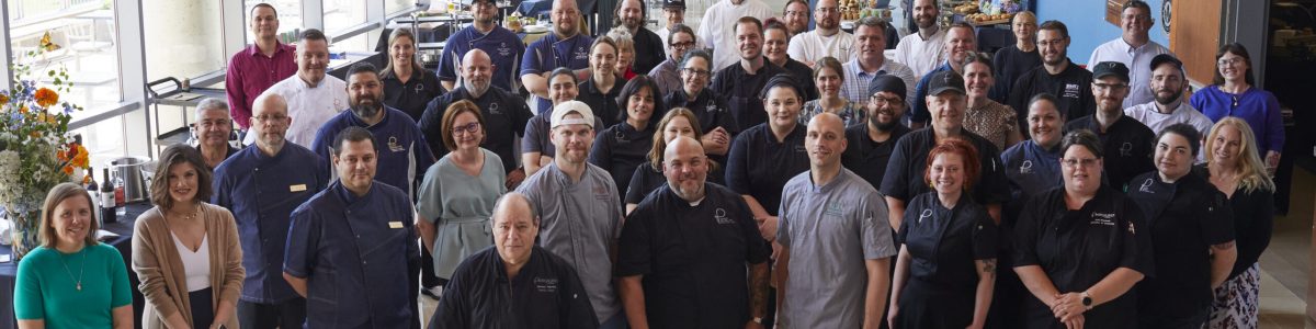 A large group of Parkhurst chefs gather at Family Meal event