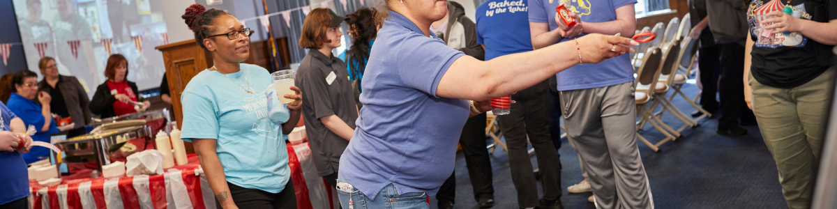 a group of team members playing games at a party